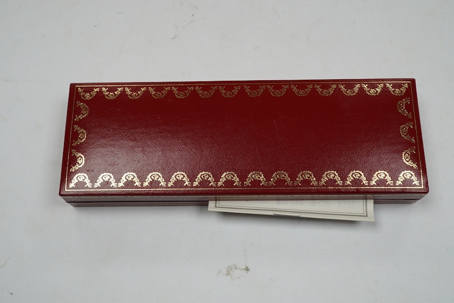 A Cartier pen, 14cm long, boxed. Condition - good